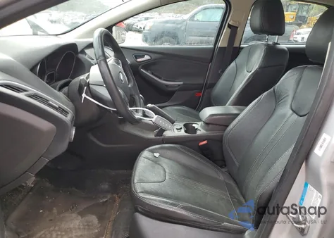 2014 Ford Focus Titanium из США, поврежденный, VIN 1FADP3J2XEL222328